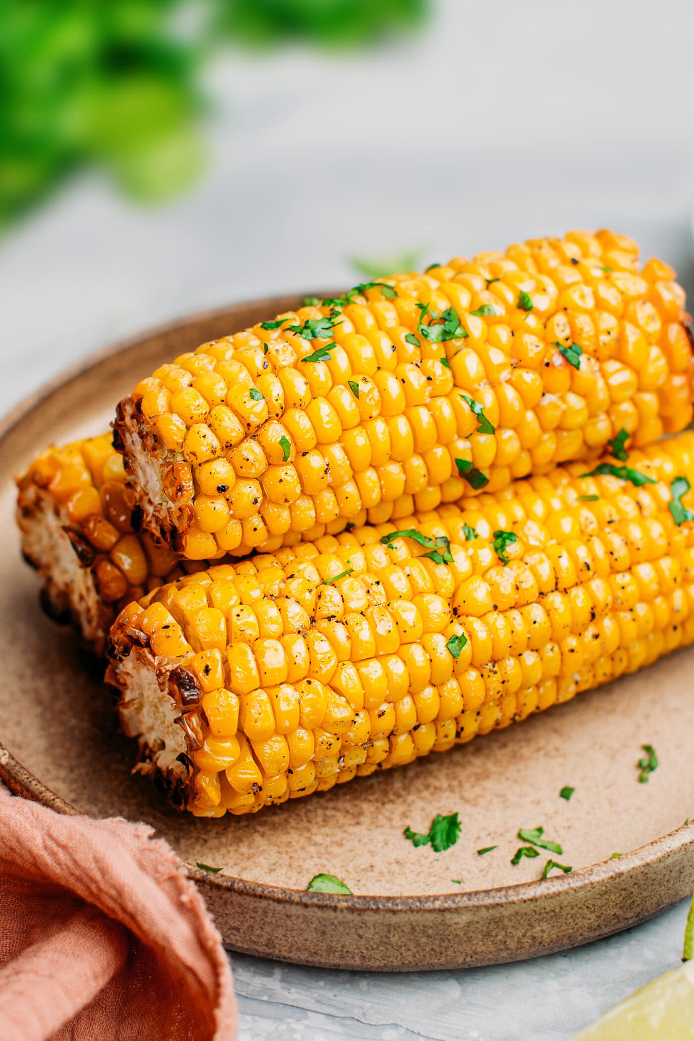 Close-up of air fryer corn on the cob.