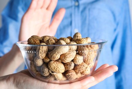 Woman experiencing food allergies