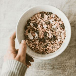 Picture of person choosing to add oats into diet.