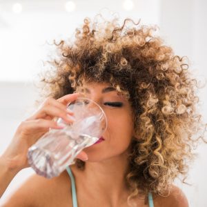 A woman drinking water
