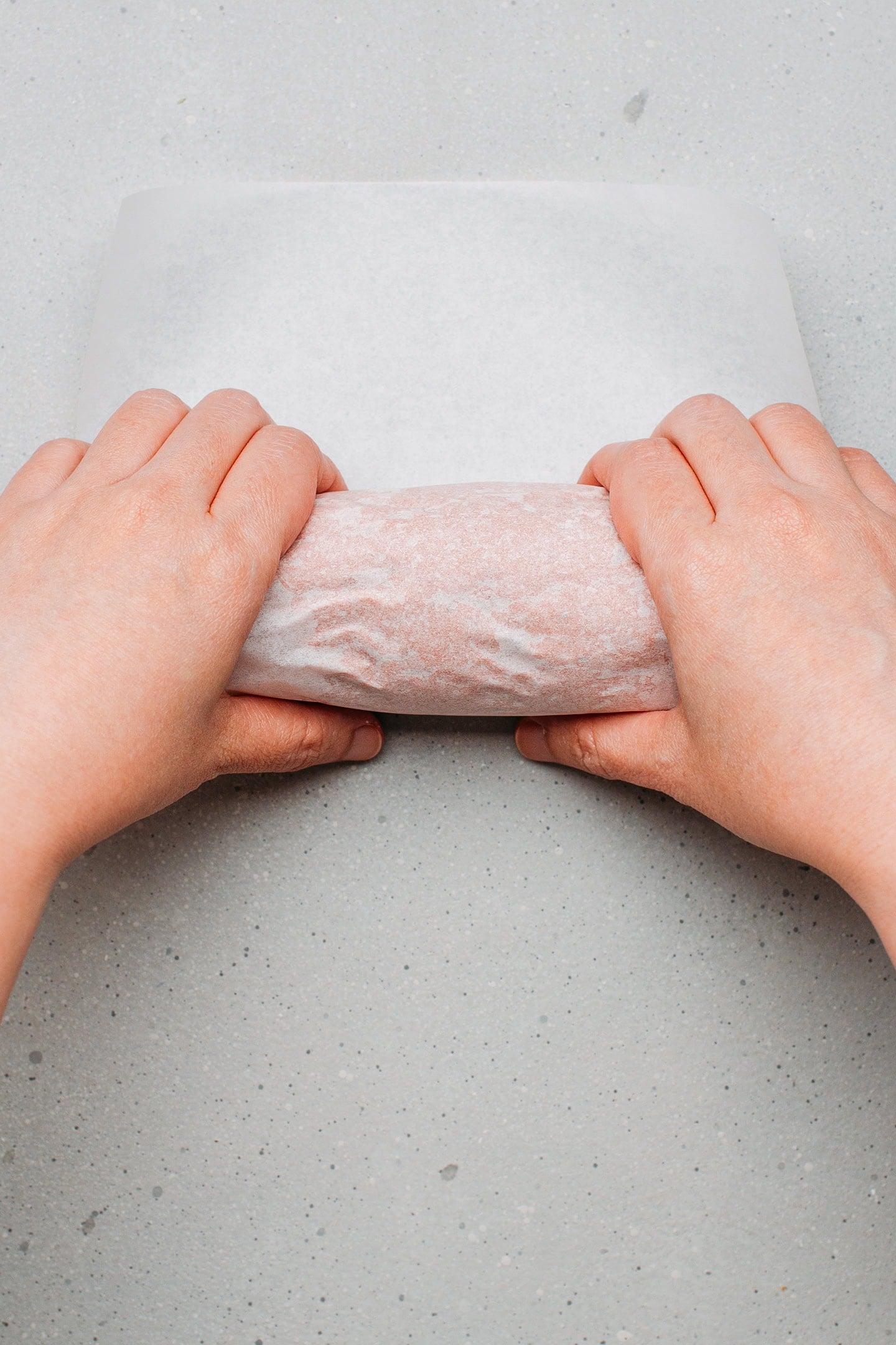 Wrapping seitan loaf with parchment paper.