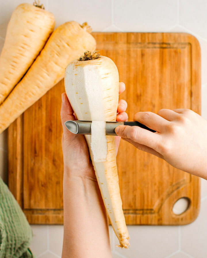 Peeling a parsnip.