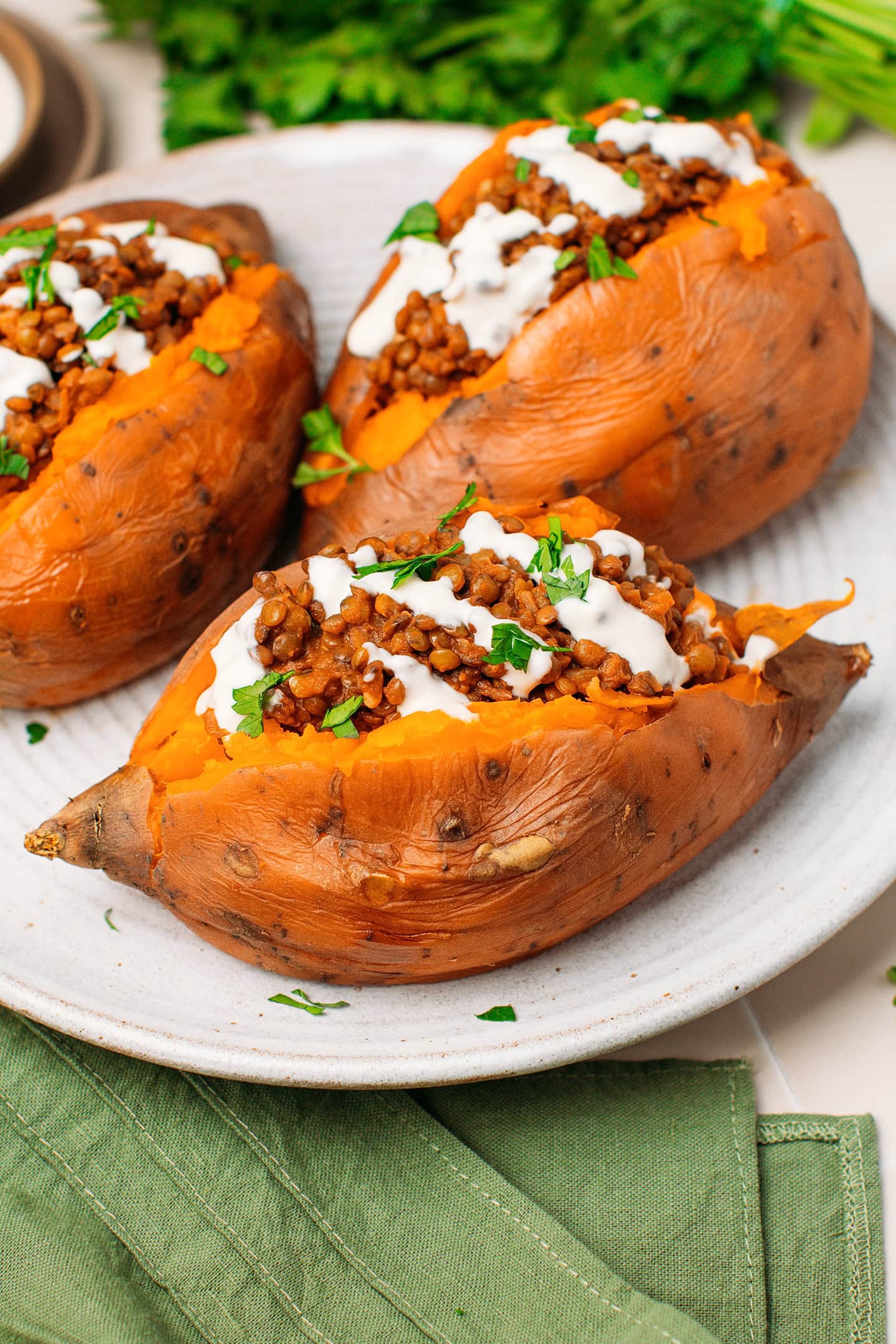 Baked sweet potato stuffed with BBQ lentils.