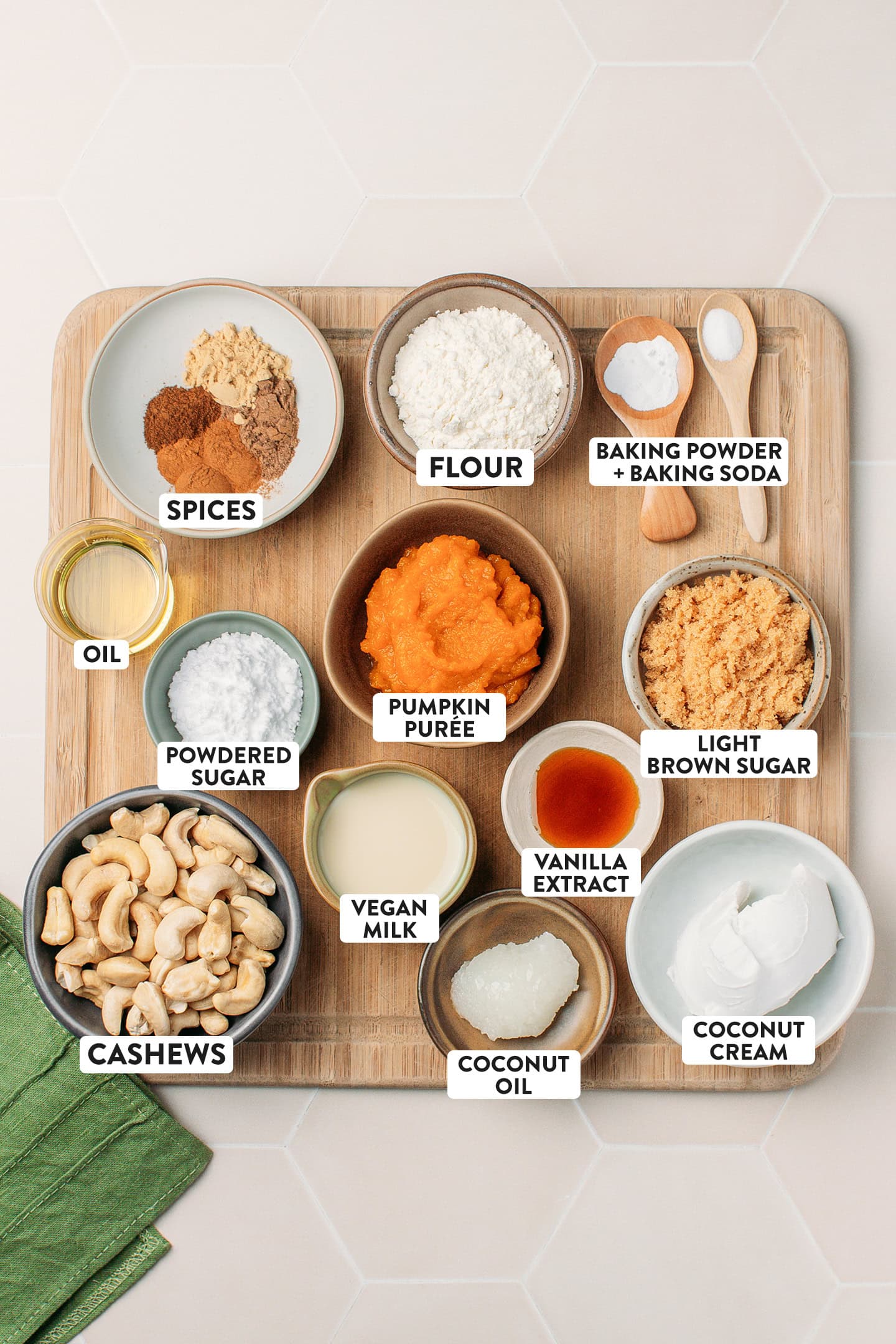 Ingredients like pumpkin purée, cashews, light brown sugar, spices, and flour.